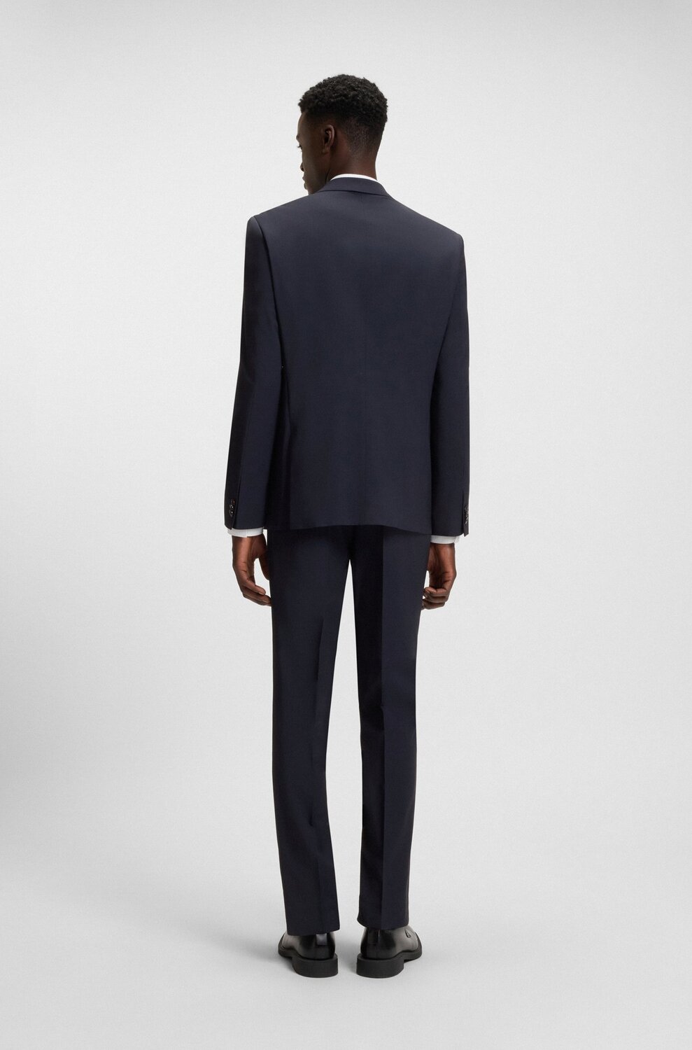 HUGO Essential Navy Colbert – Slim Fit-60% wol, 36% polyester, 4% elasthaan-HEREN PAKKEN & COLBERTS-Blauw