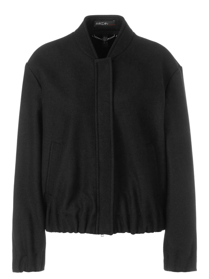 Marc Cain jas -Materiaal<br />Futter Arm: 100% polyester<br />alg.: 100% scheerwol<br />Innentasche: 50% acetaat, 50% vis