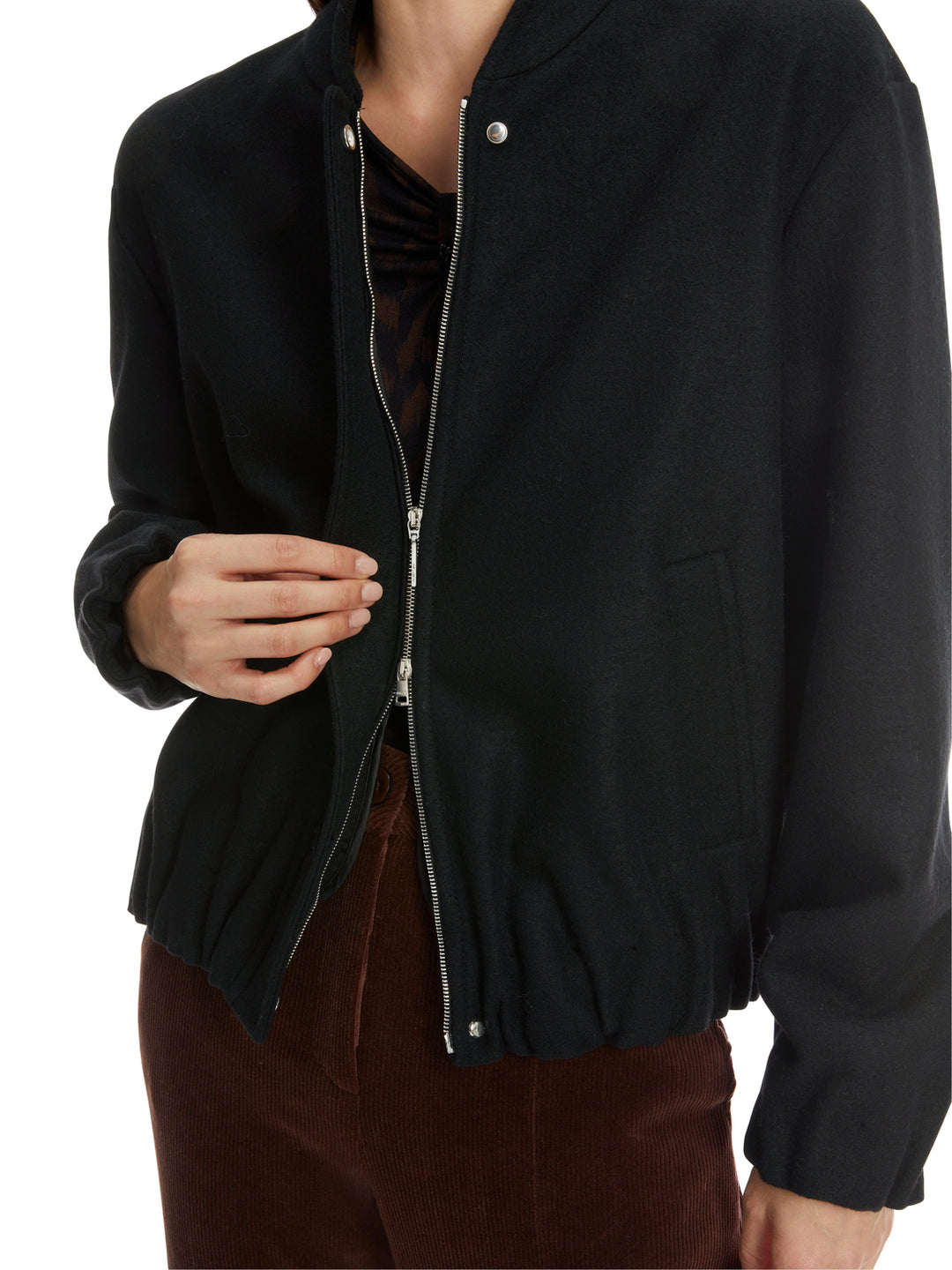 Marc Cain jas -Materiaal<br />Futter Arm: 100% polyester<br />alg.: 100% scheerwol<br />Innentasche: 50% acetaat, 50% vis