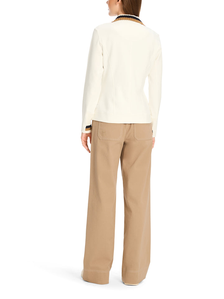 Nauwsluitende blazer van jersey-alg.: 88% katoen, 8% polyester, 4% elastaan<br />Strickbesatz: 90% katoen, 6% polyamide, 