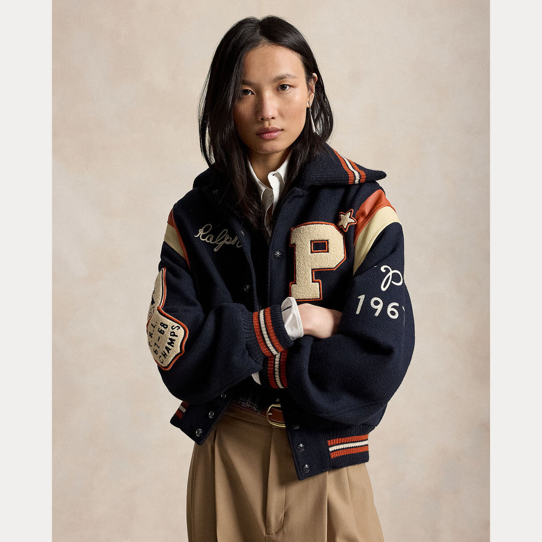 Polo Ralph Lauren Letter Jacket – Blauw-Buitenkant: 60% wol, 40% polyester <br />Afwerking: 100% leer <br />Voering romp: