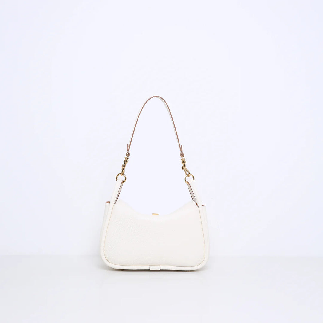 Smaak Amsterdam Cliff Tas – Cream-Afmetingen:<br />Breedte: 27 cm<br />Hoogte: 16 cm<br />Diepte: 10 cm<br /><br />Materi