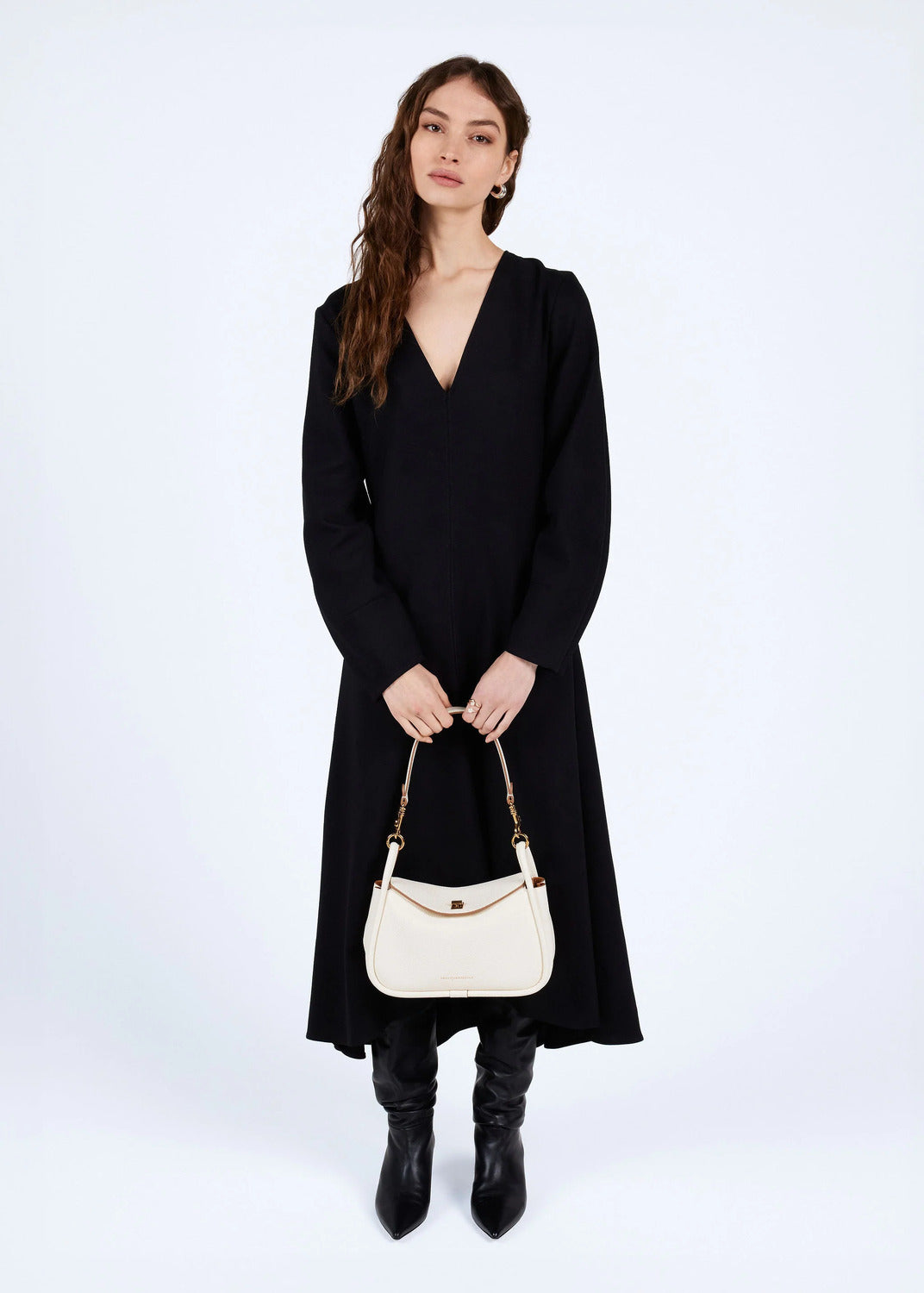 Smaak Amsterdam Cliff Tas – Cream-Afmetingen:<br />Breedte: 27 cm<br />Hoogte: 16 cm<br />Diepte: 10 cm<br /><br />Materi